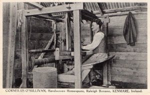 Vintage postcard showing weaver Con O'Sullivan working his loom