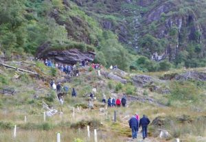 Parishioners making their way uphill to the Mass Rock at Inse an tSagairt.